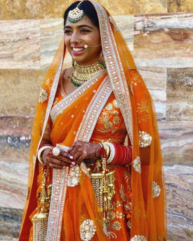 sabyasachi orange lehenga for brides