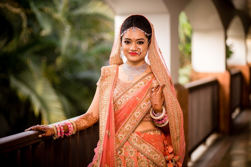 sabyasachi orange lehenga for brides