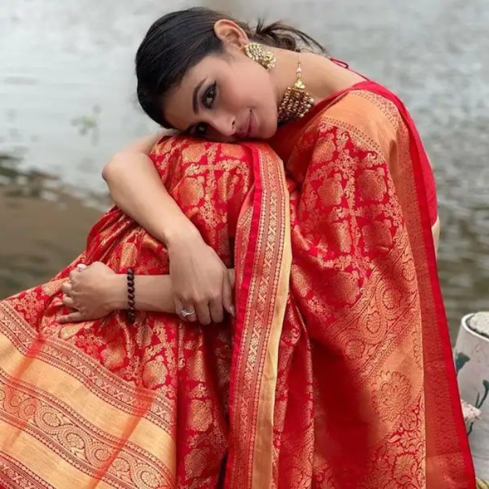 mouni roy in a red banarasi saree