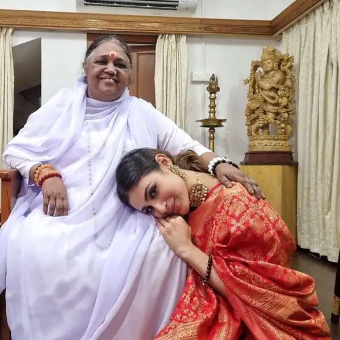 mouni roy in a red banarasi saree