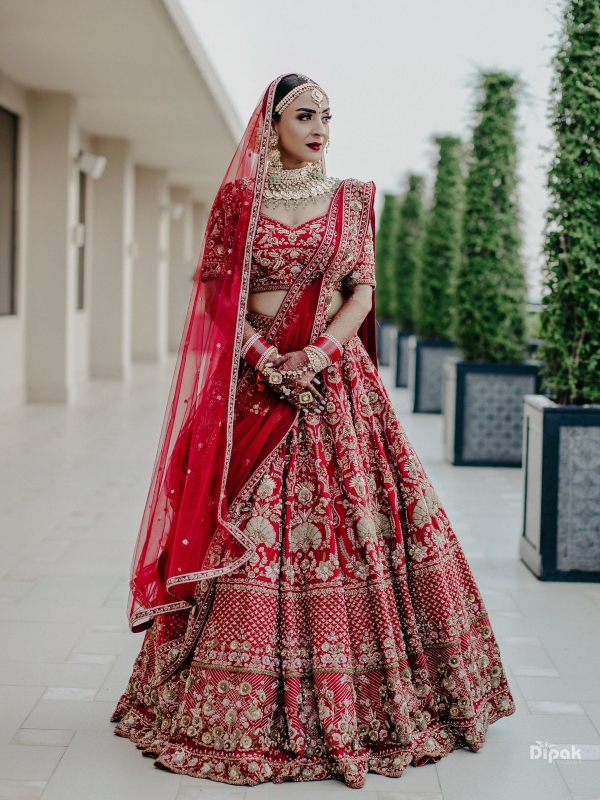 The Bride Designed Her Red Wedding Lehenga From Scratch, Styled It With Gold And Emerald Jewellery