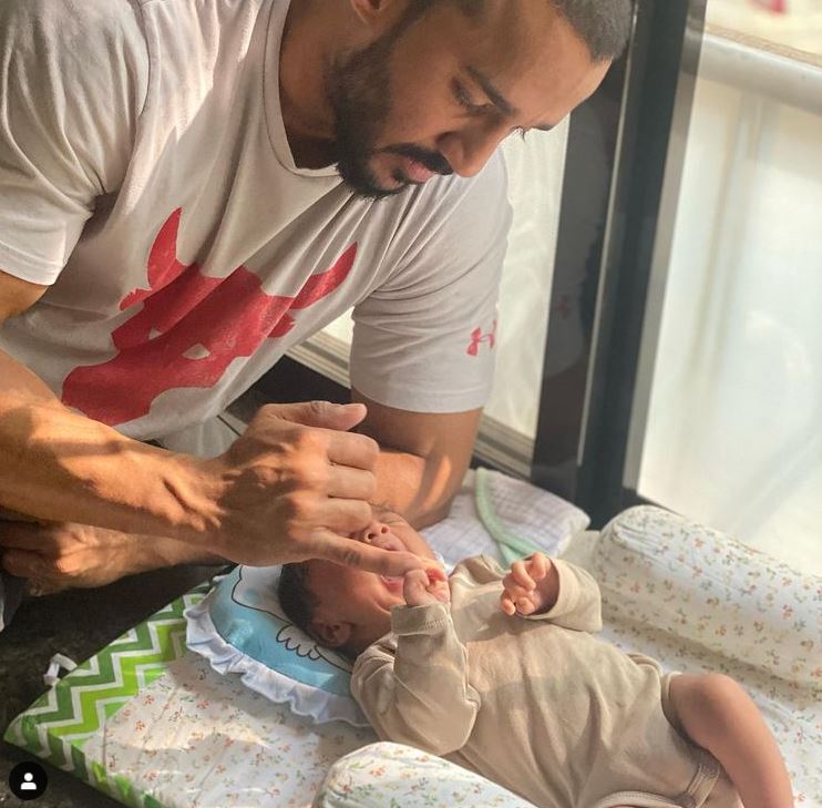 Rohit Reddy with his baby