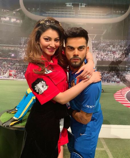 Urvashi Rautela hugs Virat Kohli wax statue