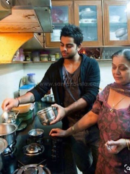 Virat Kohli with mother Saroj Kohli