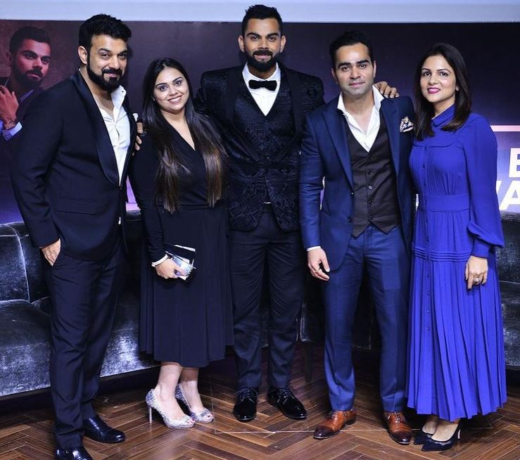 Bhawna Kohli Dhingra and Virat Kohli