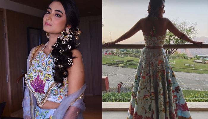 bride who had handpainted her mehendi outfit