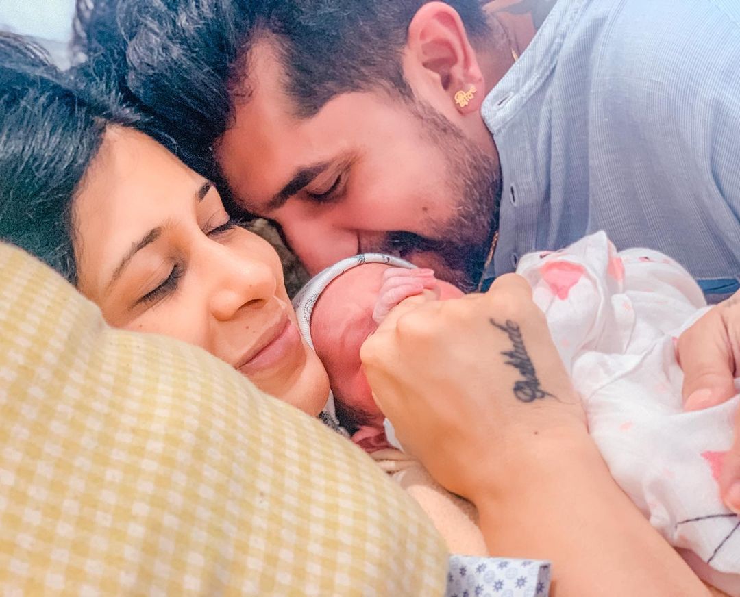 Suyyash and Kishwer with the child