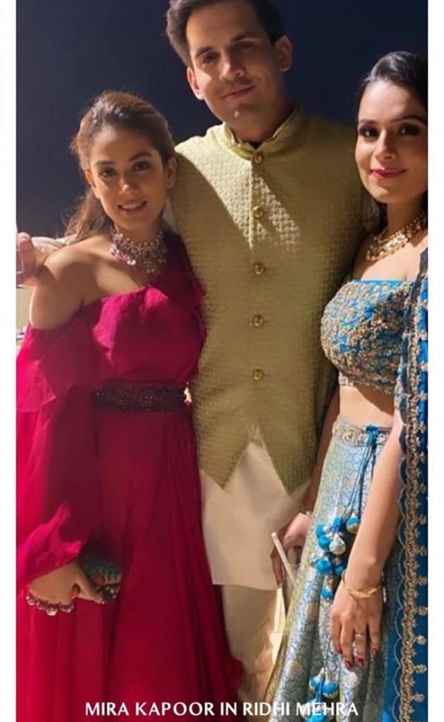 Mira with Sejal and her husband
