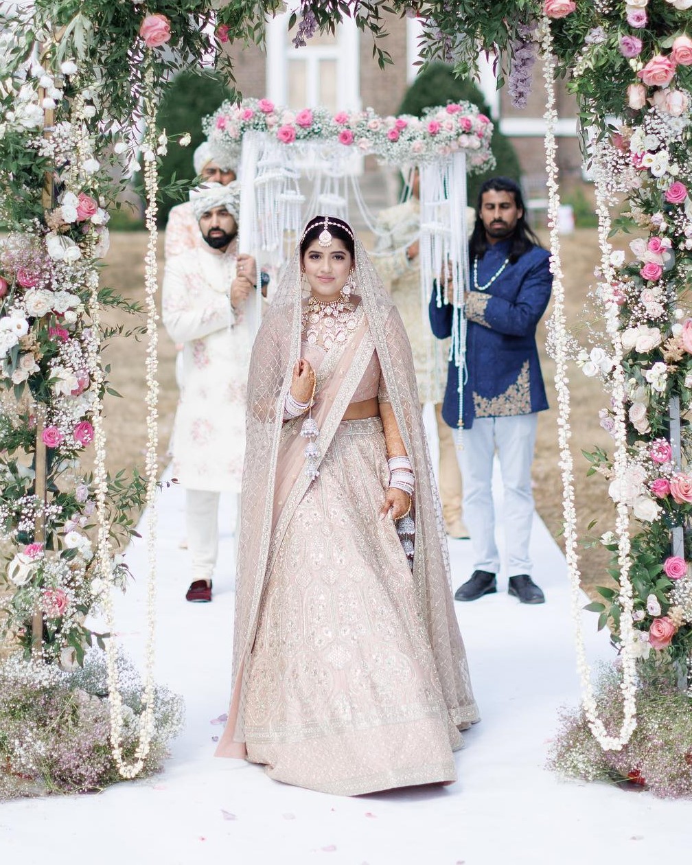 Sabyasachi Bride Wore A Serene Blush Pink Lehenga Paired With ‘Jhoomar’ Jewellery At Her Wedding