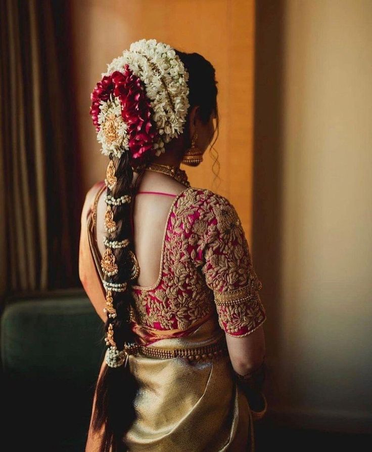 South Indian bride Pink gold silk saree Gold bridal jewelry Pink floral  hairstyle | Bridal hair jewelry, Indian bridal hairstyles, Engagement  hairstyles
