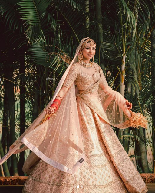 The bride of fashion designer Sabyasachi Mukherjee and her fabulous outfit.
