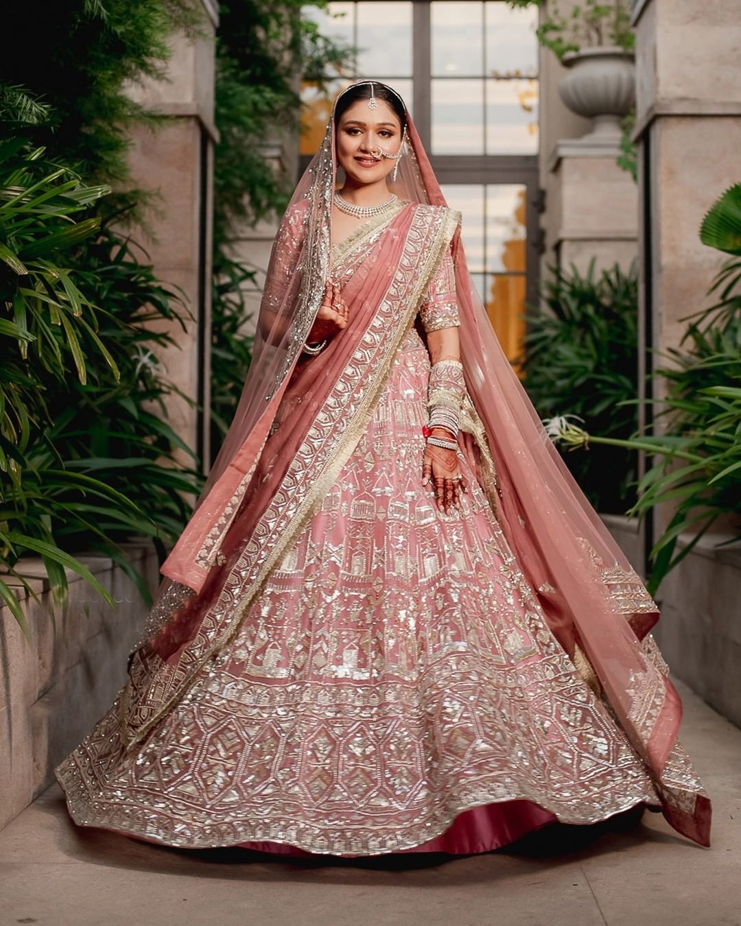 Bride Stuns In A Dusty Pink Stone-Studded Manish Malhotra Lehenga Pairs With Sleek Diamond Jewellery