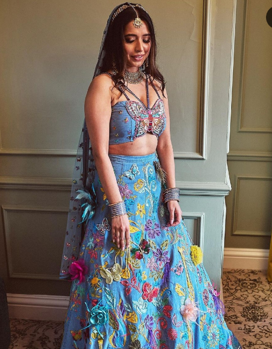 bride who wore denim lehenga designed by her father