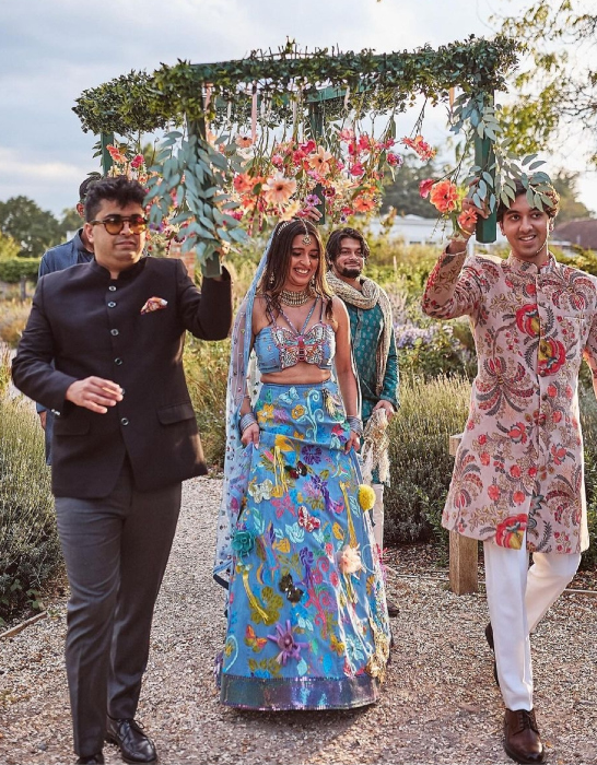 bride who wore denim lehenga designed by her father