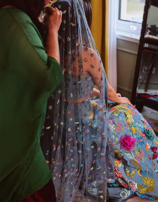 bride who wore denim lehenga designed by her father