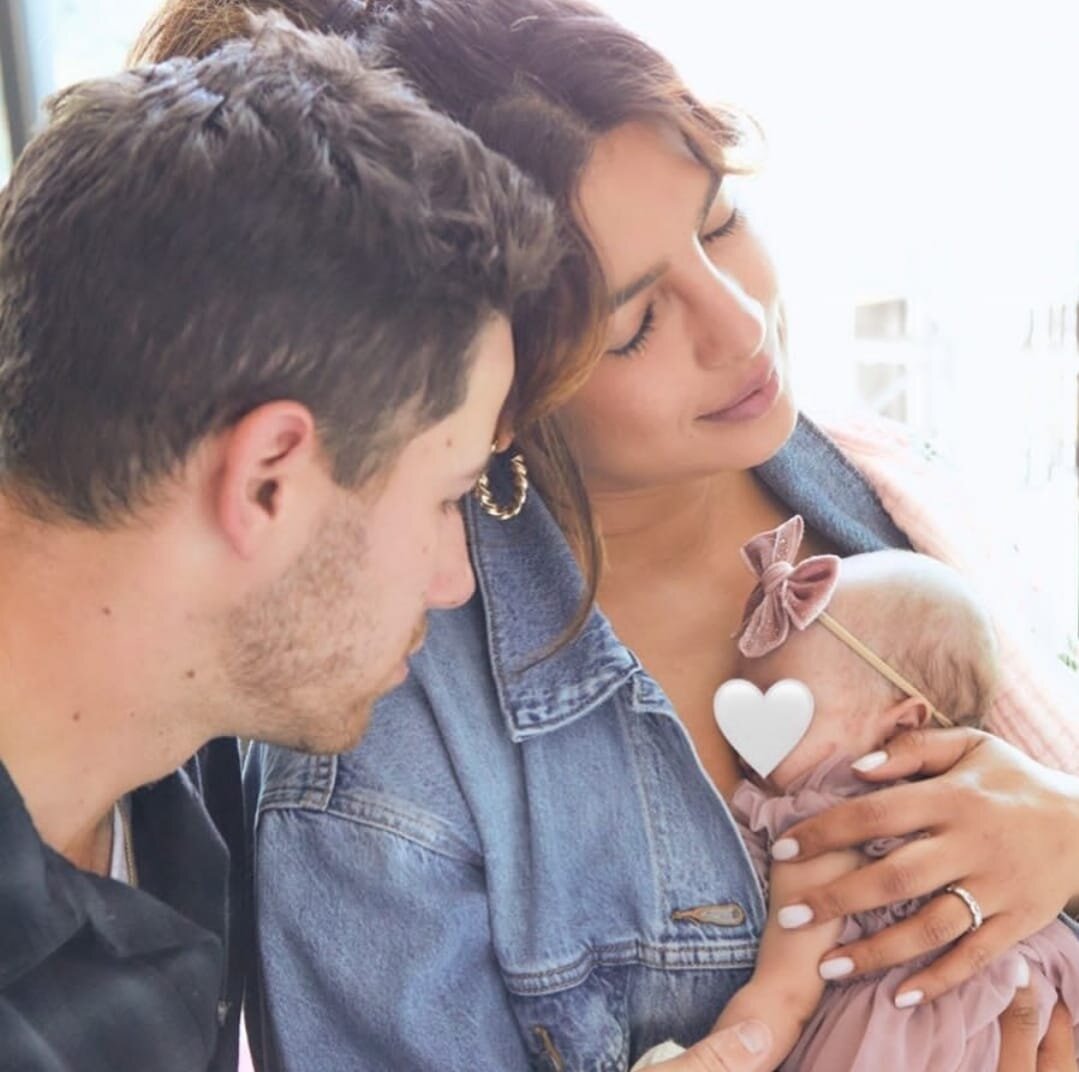 Nick Jonas and Priyanka Chopra with baby Matli