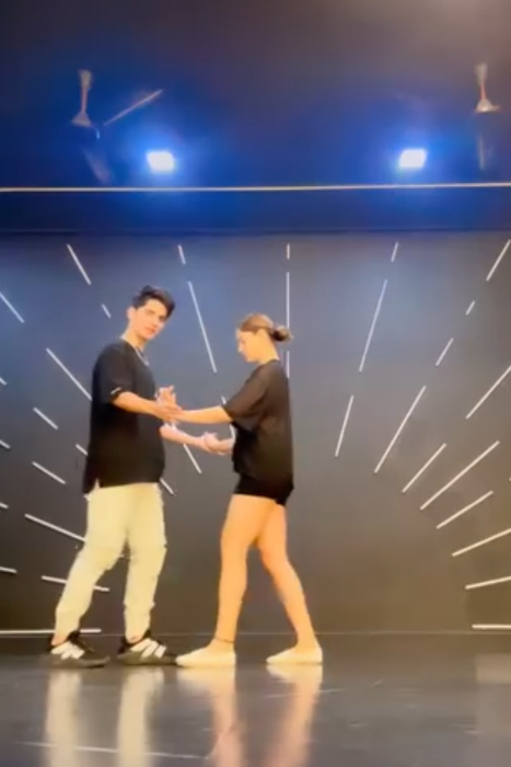 rubina dilaik shakes a leg in a traidtion video