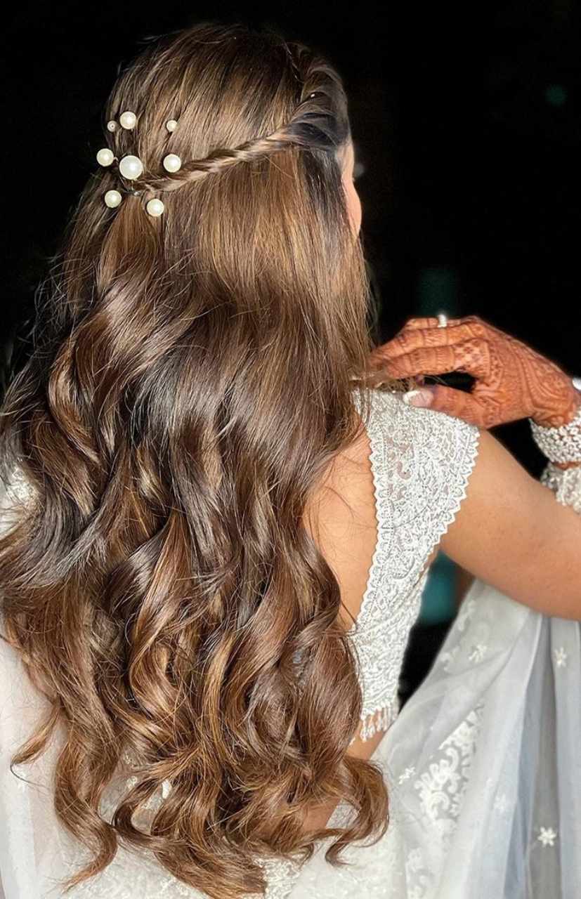 The Bride Donned A Rose Pink 'Lehenga' With Open Hairstyle For Her Day  Wedding