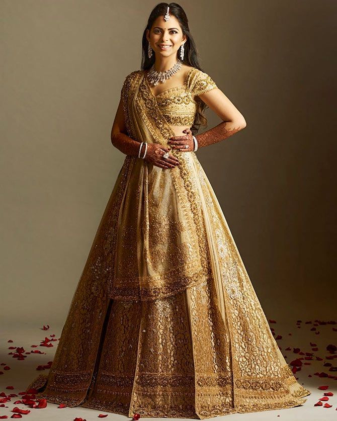 Anant Ambani pre-wedding: Isha Ambani wows in peachy gown, DeepVeer stun in  black & white ensemble - The Economic Times