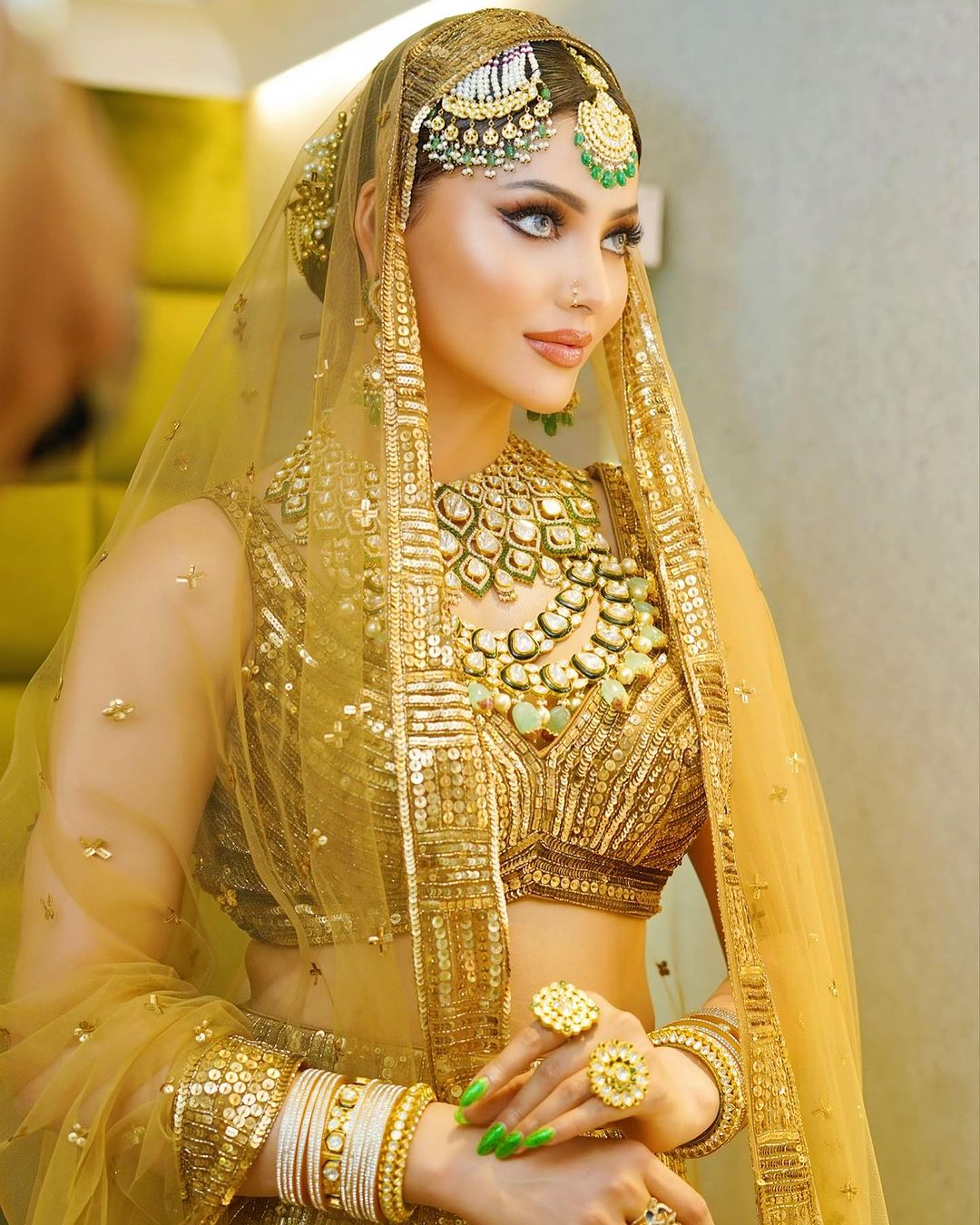 Urvashi Rautela Dons A Bridal Look Stuns In A Golden Hued Lehenga Choli With Heavy Jewellery