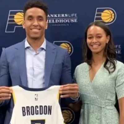 Who is Malcolm Brogdon's wife, Victoria Janowski? Met at the University of Virginia, Polish citizenship, collegiate volleyball and working as a litigation paralegal