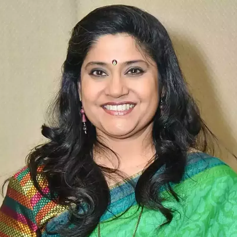 Renuka Shahane in a green saree.