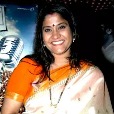 Renuka Shahane in a white saree.
