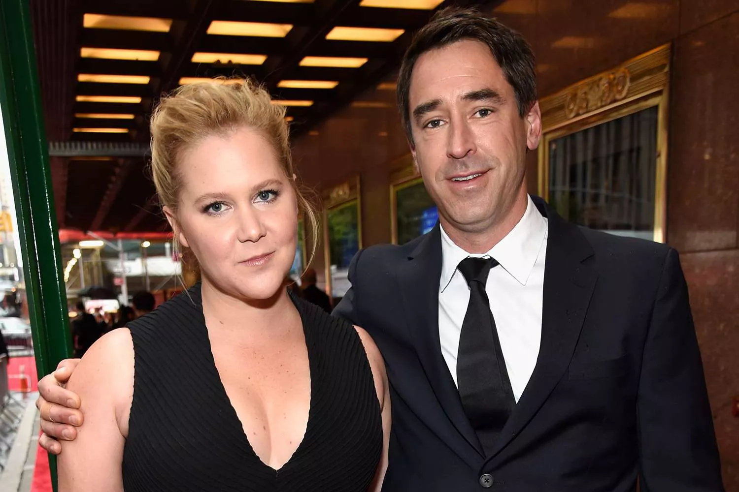 Amy Schumer and Chris Fischer