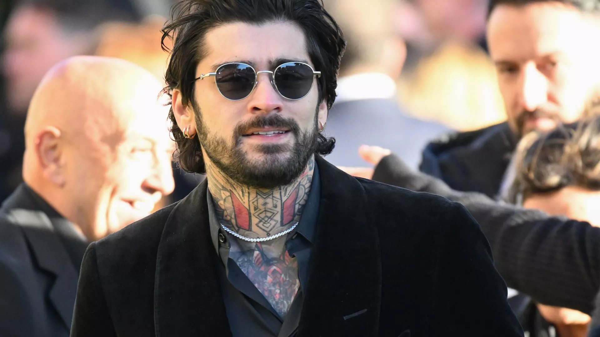 Has Zayn Malik 'Rejoined' One Direction, 10 Years After His Exit? Know What Made Him Leave The Iconic Band The internet was recently filled with reports of Zayn Malik rejoining 'One Direction' after he left the band 10 years ago. But here's the truth about the speculation. Social media users went abuzz this week after several screenshots went viral, claiming that Zayn Malik had re-registered with the One Direction company. It sparked speculation that he had decided to officially rejoin the iconic band after a decade following his dramatic exit. Several fans across X, TikTok, and Instagram began celebrating the news of his long-awaited comeback. However, here's whether the news is true or not. Did Zayn Malik really rejoin One Direction? According to reports shared by The Sun and Daily Mail, Zayn Malik has once again listed himself as an 'person with significant control' at PPM Music Limited, the company originally set up to manage the One Direction band. However, Zayn's directorship was terminated in 2016, a year after he left the group. However, fans noticed that his name once again appeared on the company's filings,, leading them to believe he had formally returned to One Direction. News reports surfaced claiming he had grown closer to his former bandmates after the tragic demise of Liam Payne in 2024. However, the industry insiders quickly clarified that this update did not involve a musical reunion of Zayn with his former bandmates. According to multiple outlets like Metro UK, the registration change was related to brand ownership, finances, and company structure, and not a revival of the old band. Meanwhile, Harry Styles, Niall Horan, and Louis Tomlinson continued to serve as directors of PPM Music Limited throughout the group's hiatus. Consequently, the addition of Zayn in the formal document is merely a structural adjustment, not a creative comeback. What led to the confusion over Zyan Malik's rejoining One Direction? The timing of Zayn Malik's update on One Direction's board added more fuel to the rumours of his rejoining. Just a few weeks earlier, reports suggested that Zayn and Louis had signed a multi-million-pound deal for a Netflix road-trip documentary where they would explore their personal journey and life in One Direction. A source told TheThe Sun that Liam Payne's death had brought the former bandmates closer together, sparking hope that they were planning to rebuild their strained bonds. At the same time, Zayn has updated his country of residence to the United States in the Companies House Filing, further convincing fans that he was planning a move. But as of now, neither Zayn nor any of the remaining 1D members have addressed the speculation publicly. Moreover, no official reunion has been announced. Why did Zayn Malik leave One Direction? Zayn Malik quit One Direction in March 2015,, leaving the band's fans in shock. During that time, he mentioned that he wanted to be a normal 22-year-old who could relax and have some private time after being exhausted. Additionally, he expressed his desire to step away from the intense spotlight. Over the years, he had openly addressed the reasons for his departure from the band. In 2023, during an interview with the Call Her Daddy podcast, Zayn explained that the group had reached a point of saturation and admitted that he wanted to pursue his own creative direction. Alongside, he hinted that behind-the-scenes there was a lot of politics making him feel that the band's end was approaching. Consequently, he left the band. More about One Direction One Direction was formed in 2010 on The X Factor and went on to become one of the biggest boy bands in history. They sold more than 70 million records, went on tours worldwide, and won around 200 awards, including the Brit Awards, American Music Awards, and Billboard Music Awards. However, they went on an indefinite hiatus in 2016, shortly after releasing their fifth album as a four-piece. 1
