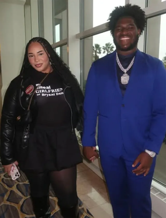 Tyler Booker with girlfriend