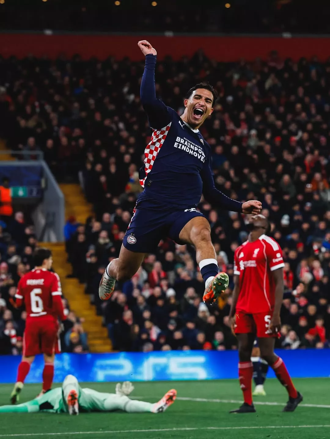 PSV winger-forward, Couhaib Driouech, scores two goals against Liverpool at Anfield
