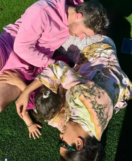 Priyanka Chopra, Nick Jonas, and their daughter