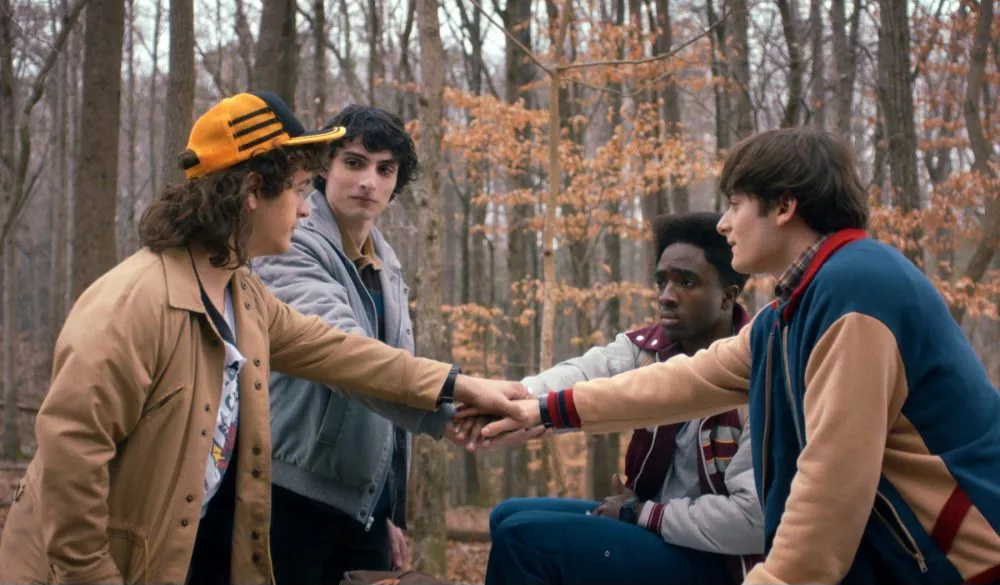 Stranger Things Season 5 has finally dropped, and Netflix's iconic sci-fi series has spared no time in pulling viewers back into the chaos of Hawkins. The highly anticipated episodes of Stranger Things 5, Volume 1, encompass four power-packed episodes that push the audience straight into darker territory. 'Eleven', 'Hopper', and the rest of the Hawkins crew have now returned to a town turned into a quarantined, militarized zone where the Upside Down no longer exists. Needless to say, fans expected big twists, but the Duffers have doubled down, setting the countdown for the grand finale.  What secrets are unveiled in the highest-rated episode 4 of Stranger Things 5? Among the initial four episodes released in Stranger Things 5, Volume 1, episode 4 titled 
