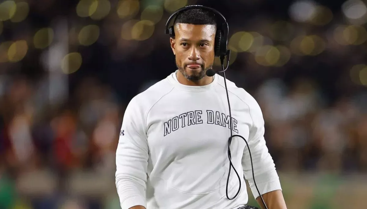 Notre Dame's head coach, Marcus Freeman, reacts to the CFP snub and the team's controversial decision to decline bowls, and the 2026 playoff berth