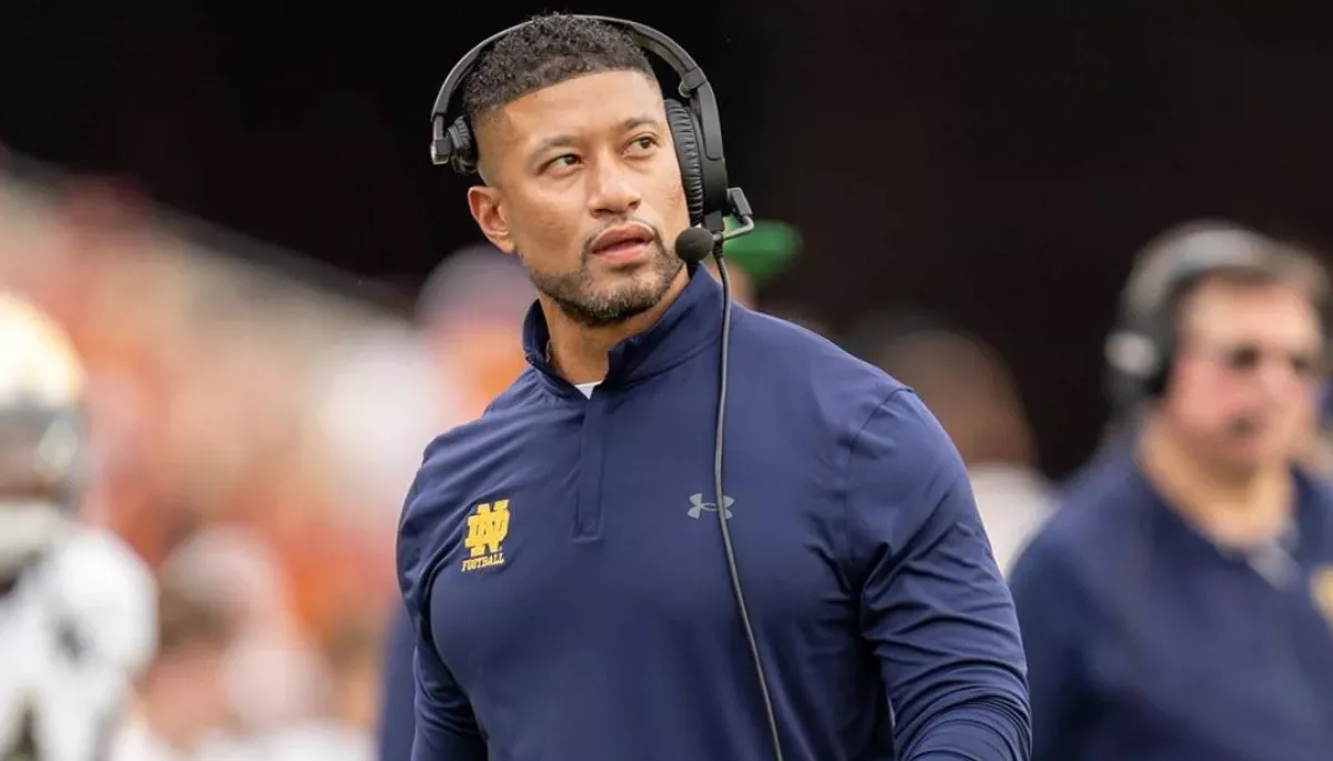 Notre Dame's head coach, Marcus Freeman, reacts to the CFP snub and the team's controversial decision to decline bowls, and the 2026 playoff berth