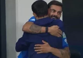 Kohli hugs Gambhir