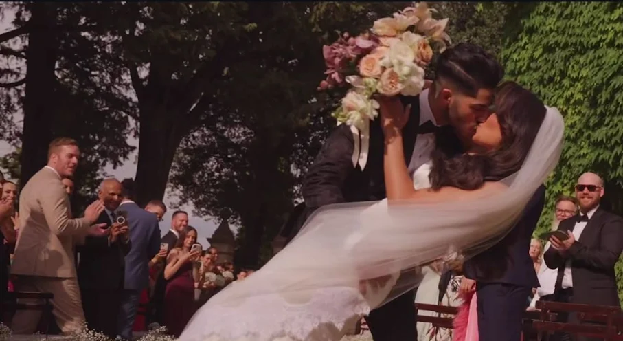 Mena Massoud and Emily Shah