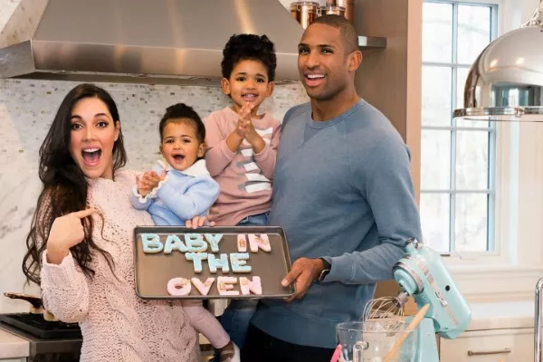 Amelia Vega and Al Horford