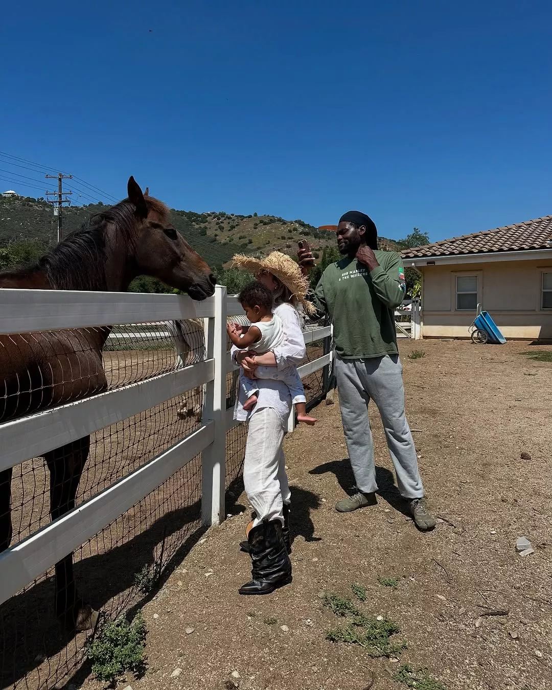 Isaiah Stewart with his wife and kid