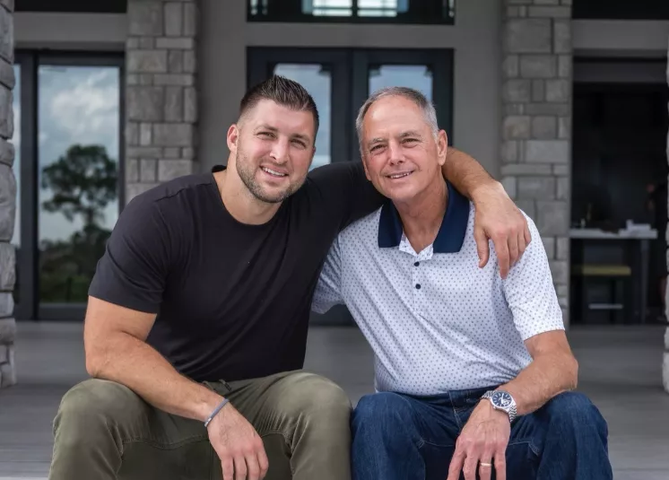 Tim Tebow with his father