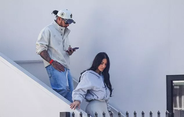 Kim Kardashian and Lewis Hamilton 