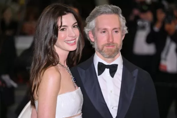 Adam Shulman and Anne Hathaway