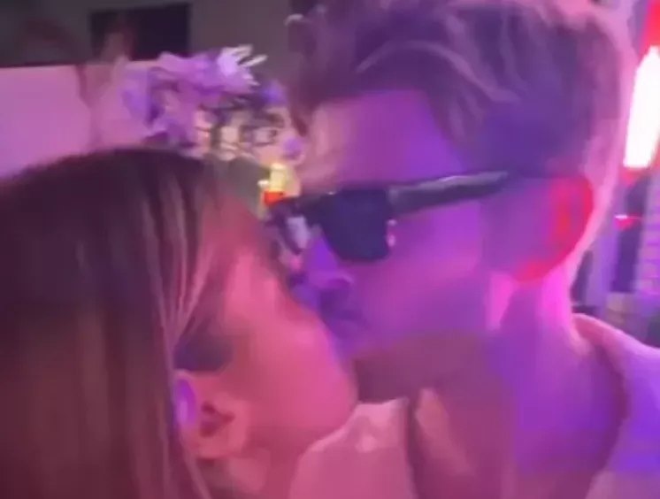 Kyle Cooke kissing mystery woman