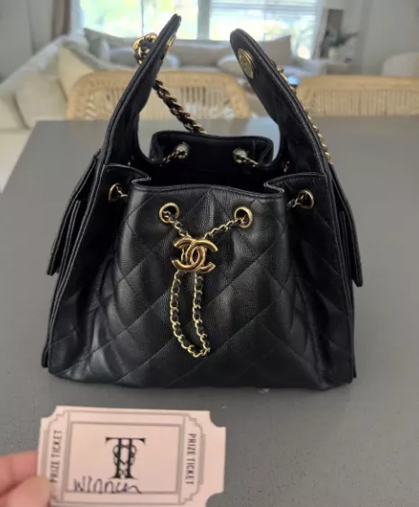 Jackie Tranquil won Chanel handbag at Taylor Swift wedding