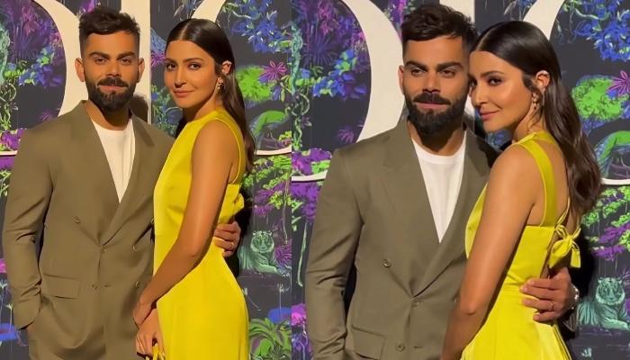 Anushka Sharma Pairs A Wrapper Dress With A Tiny Purse As She Poses With Virat At Dior Fashion Show
