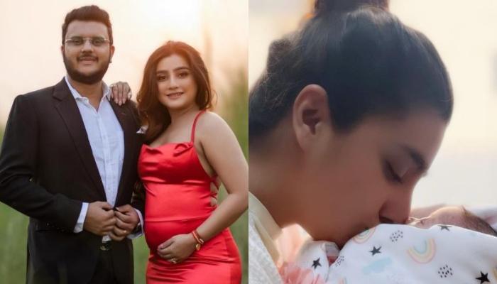 Neha Marda Sweetly Kisses Her Newborn As The Baby Sleeps Peacefully In A Rainbow-Printed Swaddle