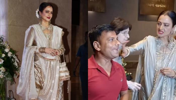 Rekha Dazzles In An Embroidered Suit-Saree At An Event, Fans React As She Candidly Slaps A Paparazzo