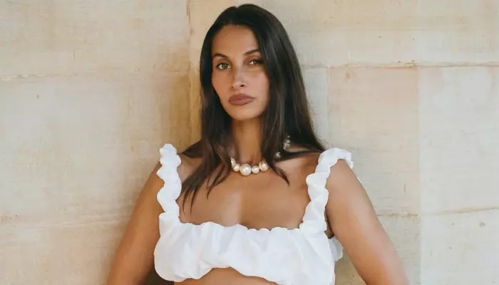 Pregnant Influencer Reveals Flight Attendant Rudely Refused To Help 'Lift Her Bag' Despite Her Pleas